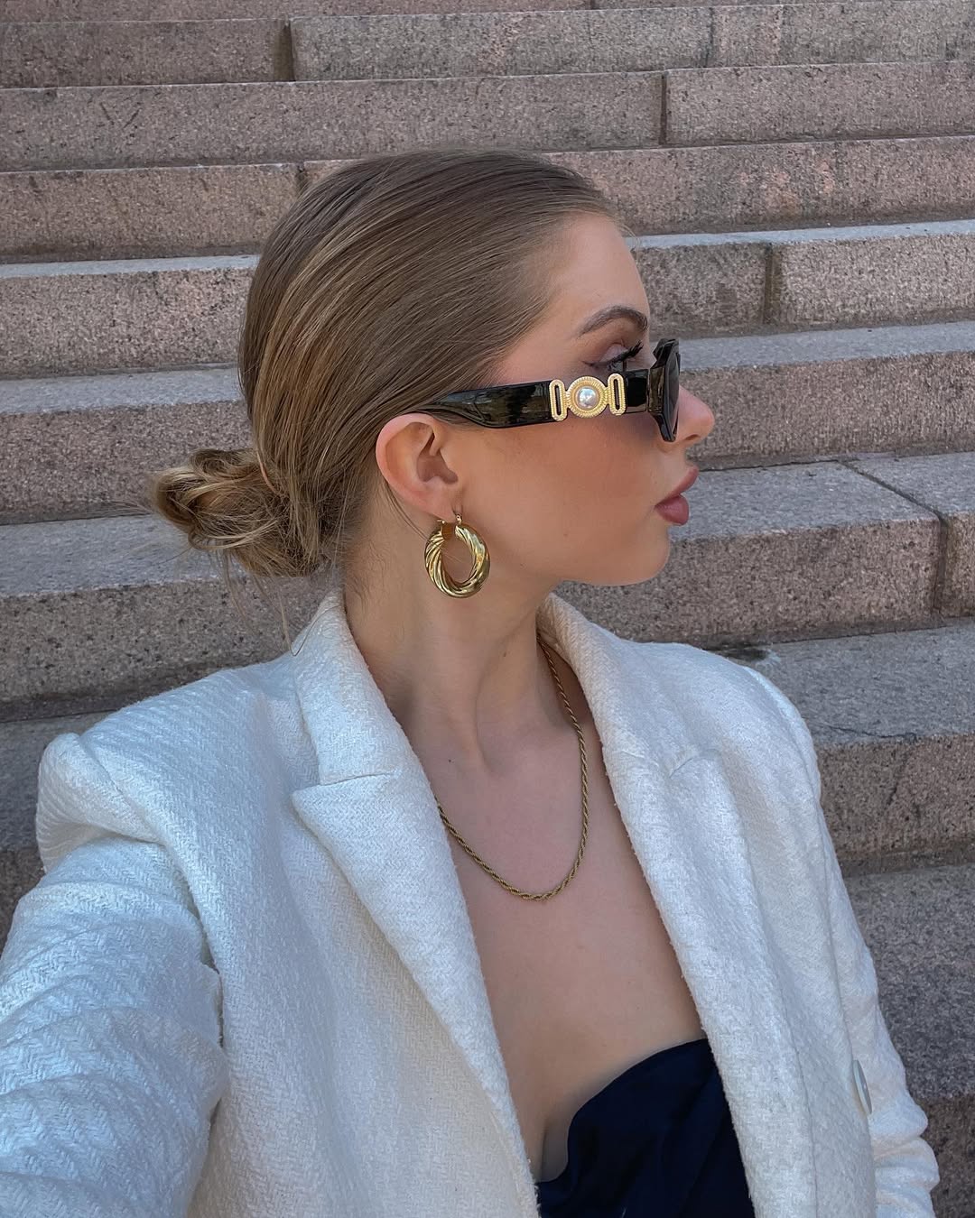 Undone Low Bun With Wispy Face-Framing Strands