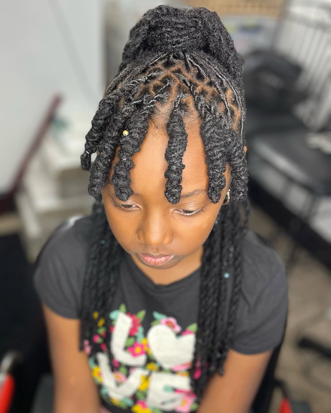 Updo Locs With Twisted Front Tendrils