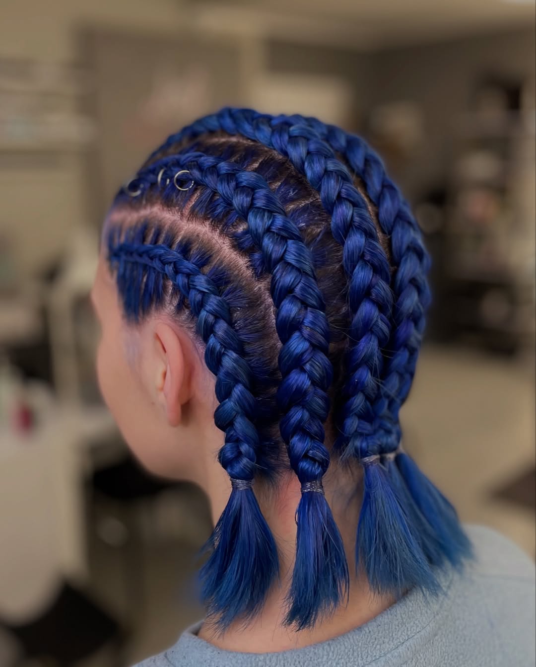 Vibrant Blue Cornrows With Silver Hair Rings