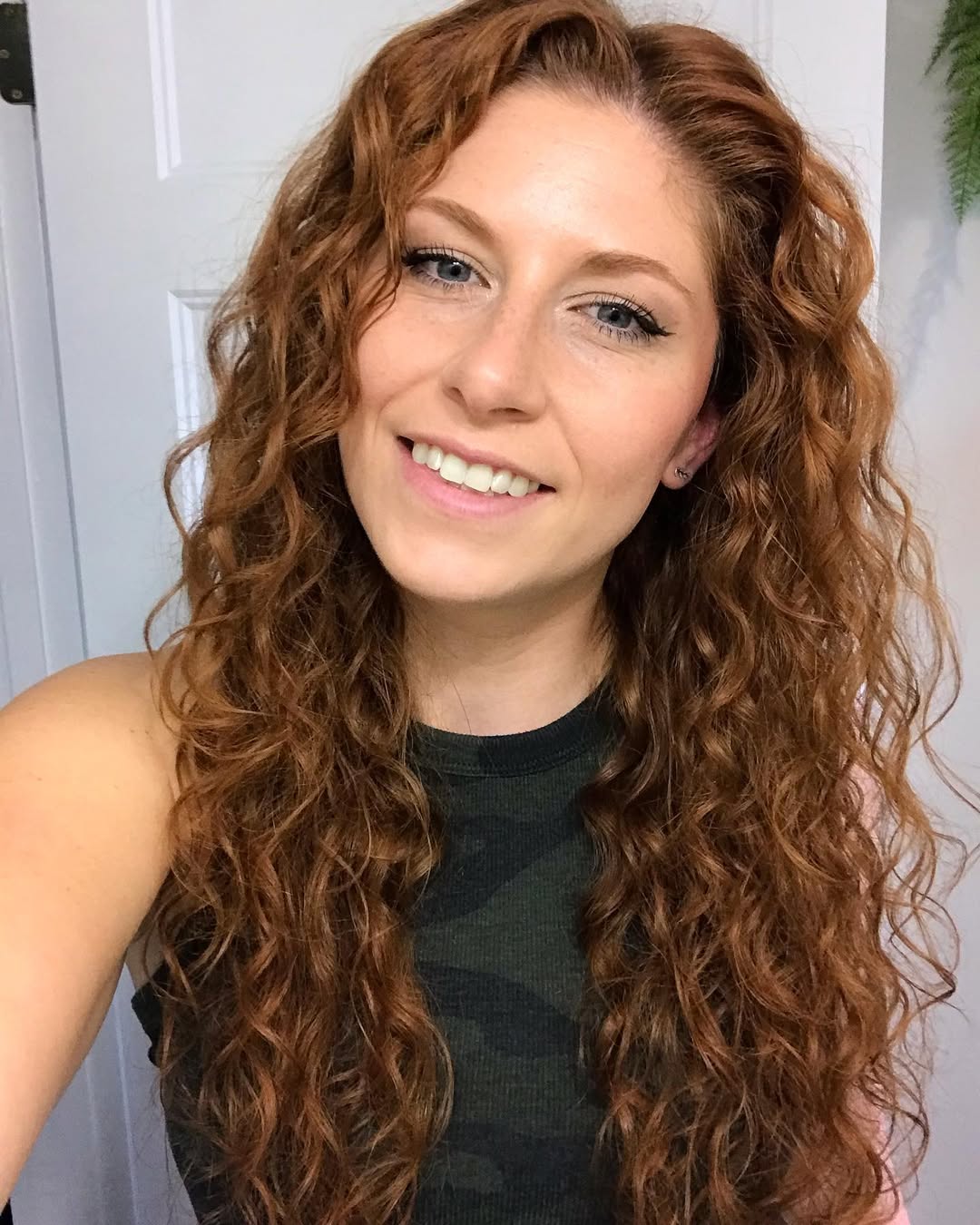 Vibrant Copper Curls With Natural Volume