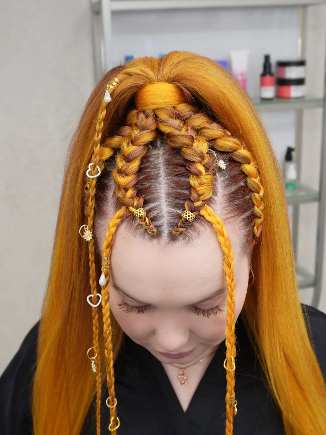 Vibrant Orange Braids With Gold Hair Cuffs
