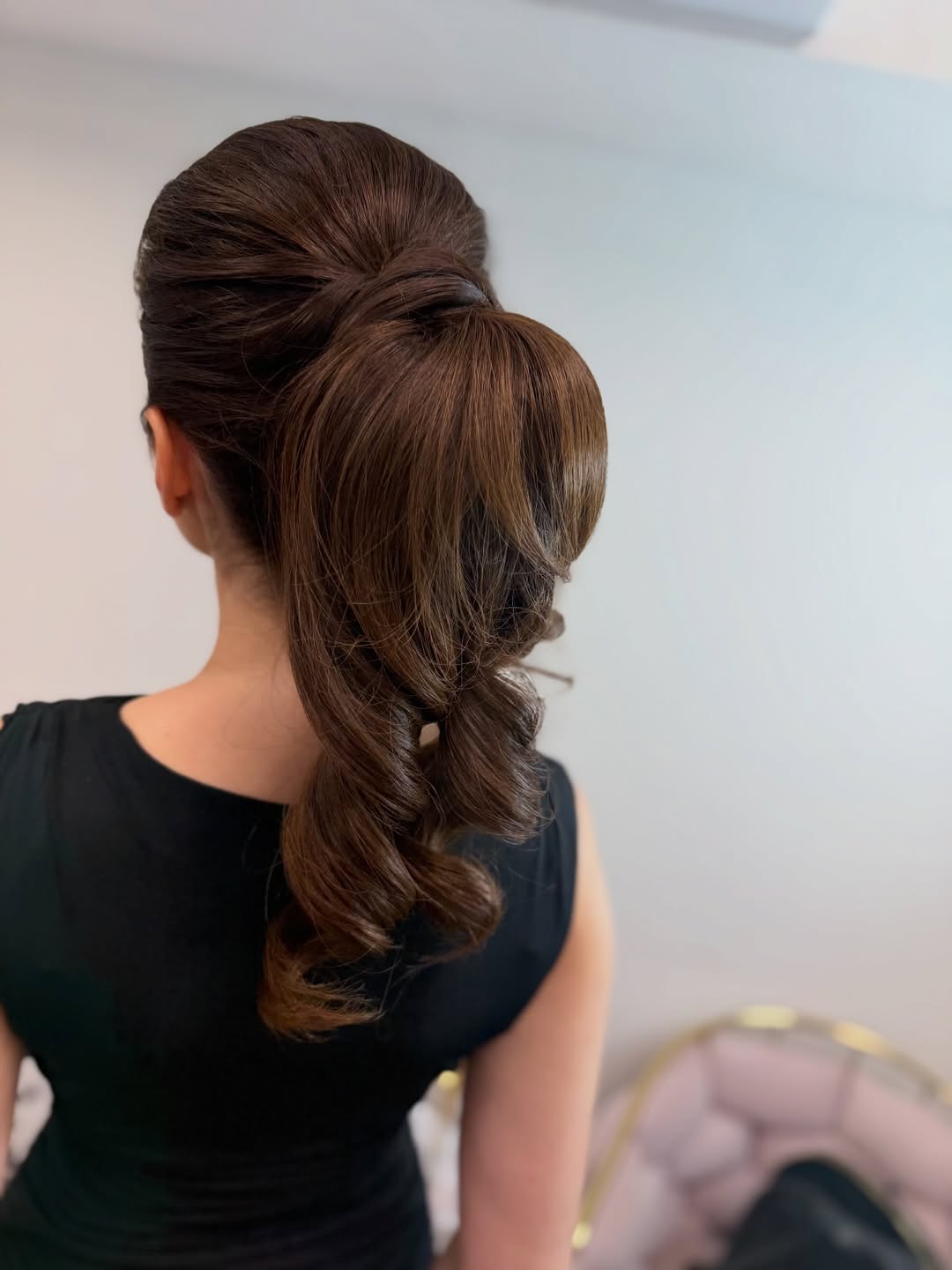 Voluminous Auburn Ponytail With Loose Curls