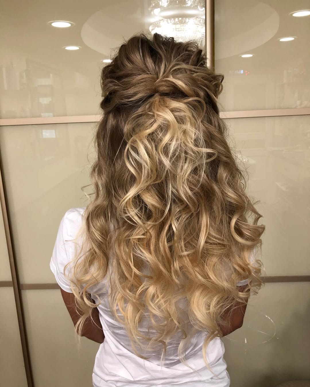 Voluminous Half-Up Curls With Honey Blonde Balayage