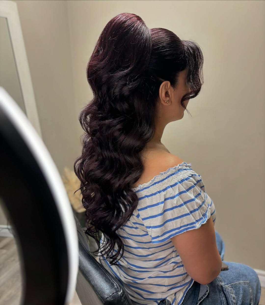 Voluminous High Ponytail With Glamorous Waves