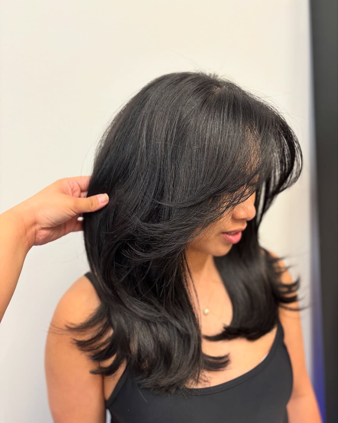 Voluminous Layered Black Hair With Face Framing