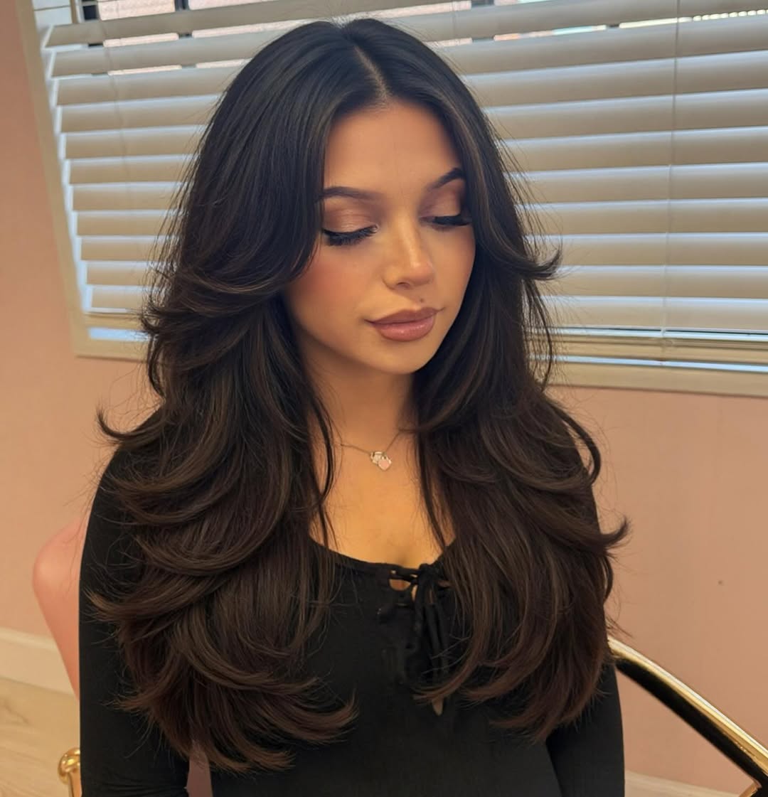 Voluminous Layered Hair With Face-Framing Bangs