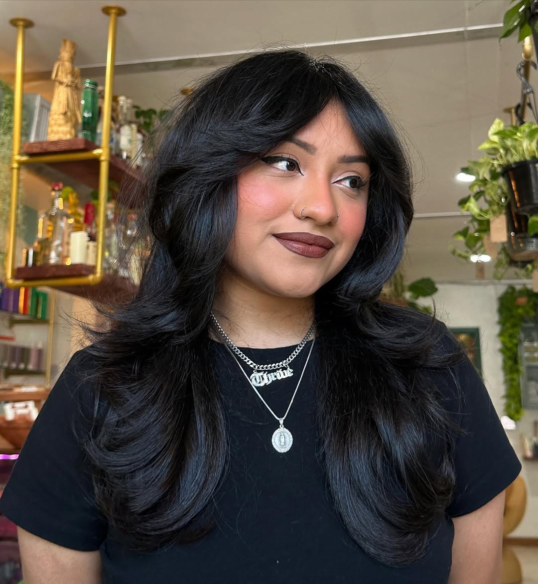 Voluminous Shag With Face-Framing Layers And Bangs