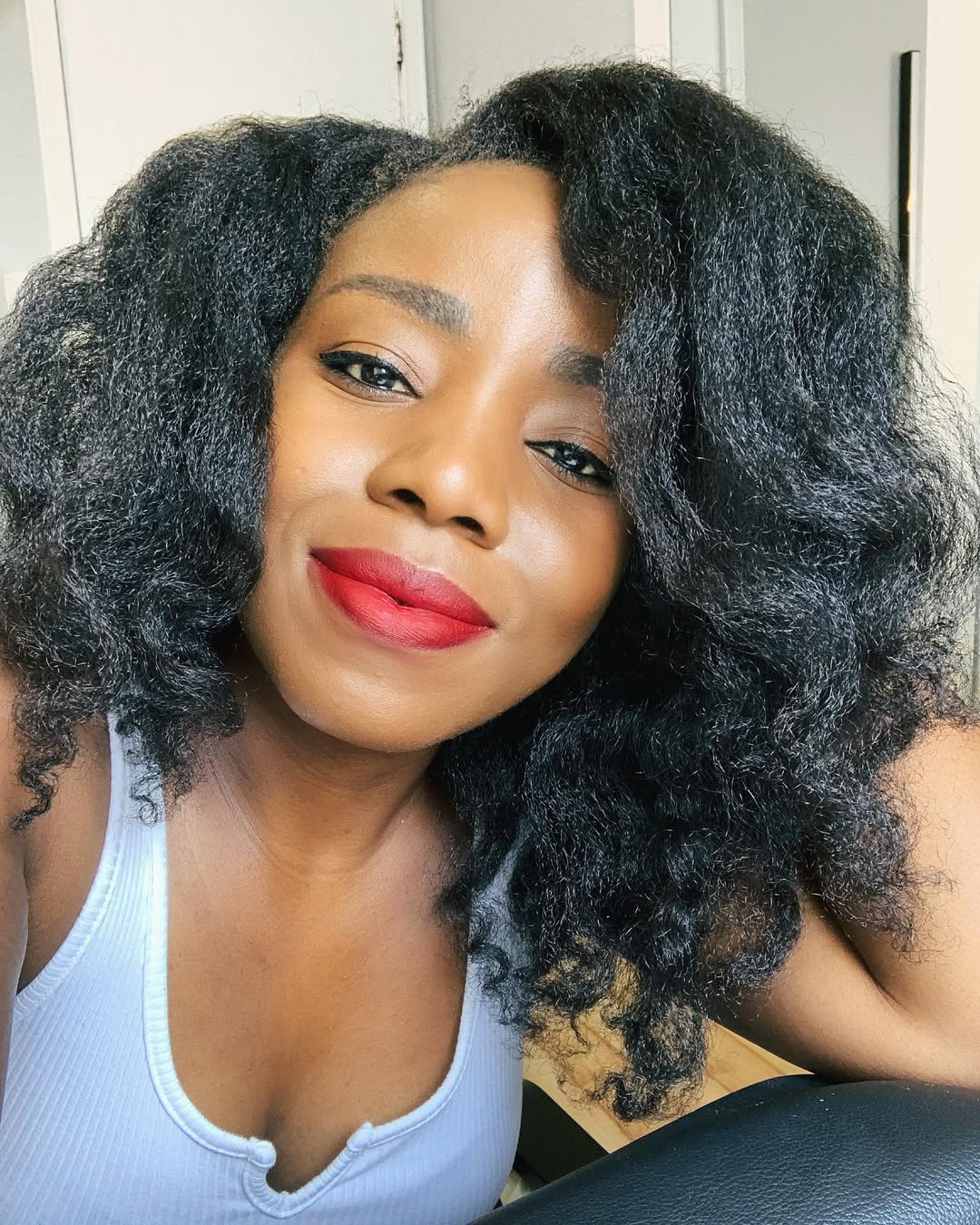 Voluminous Side Parted Coily Natural Hair