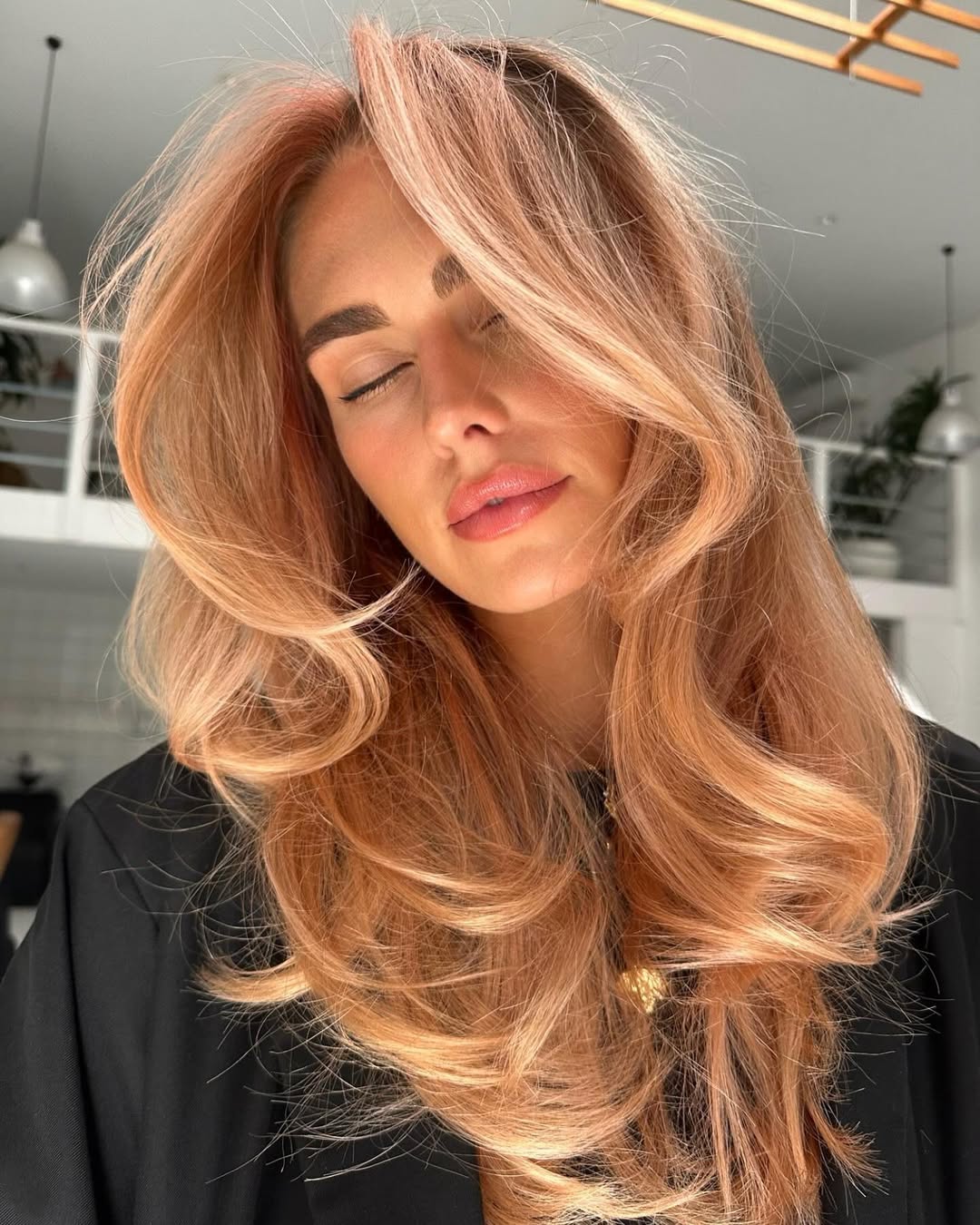 Voluminous Strawberry Blonde Layers With Face Frame