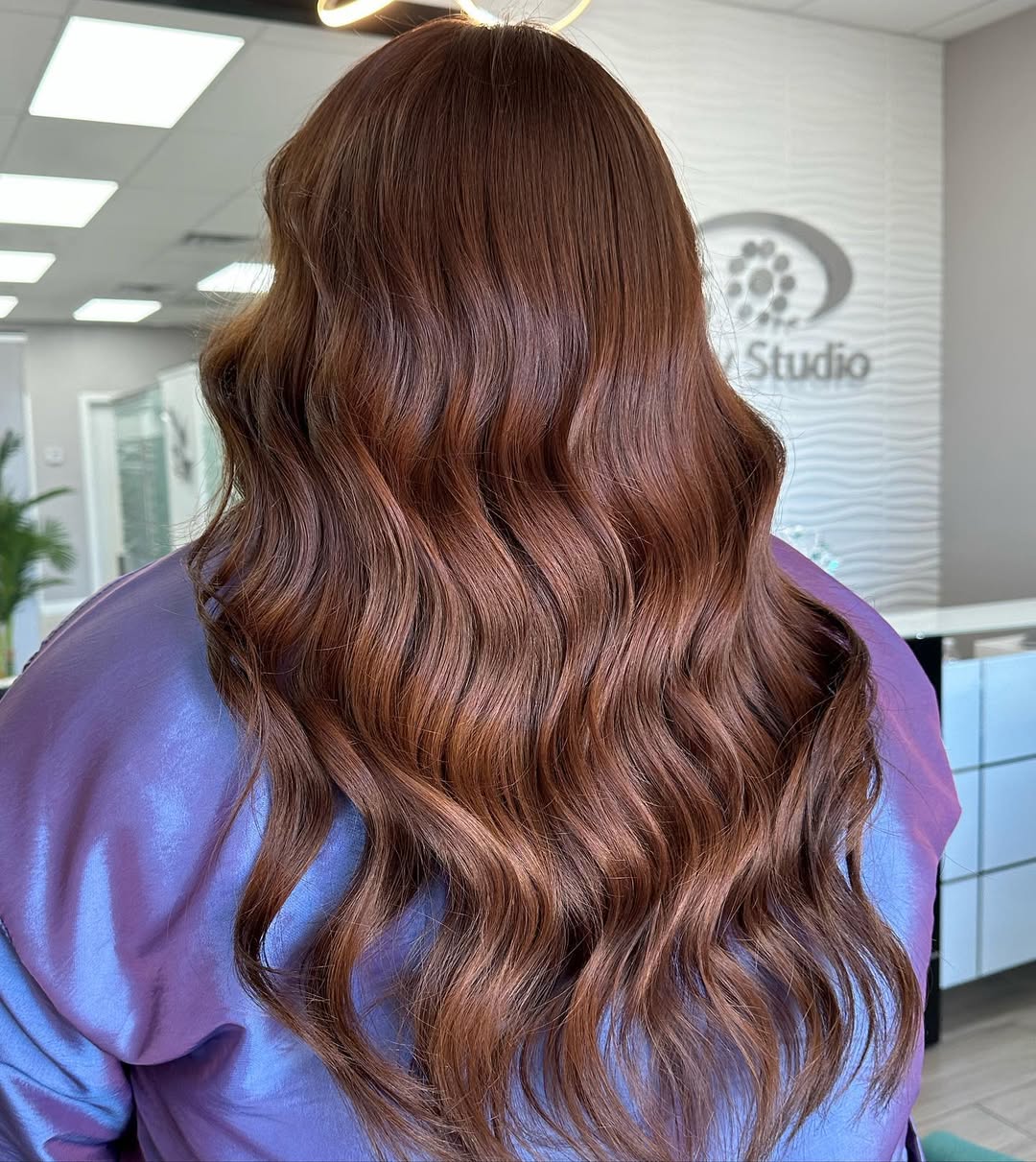 Warm Auburn Waves With Face Framing Layers