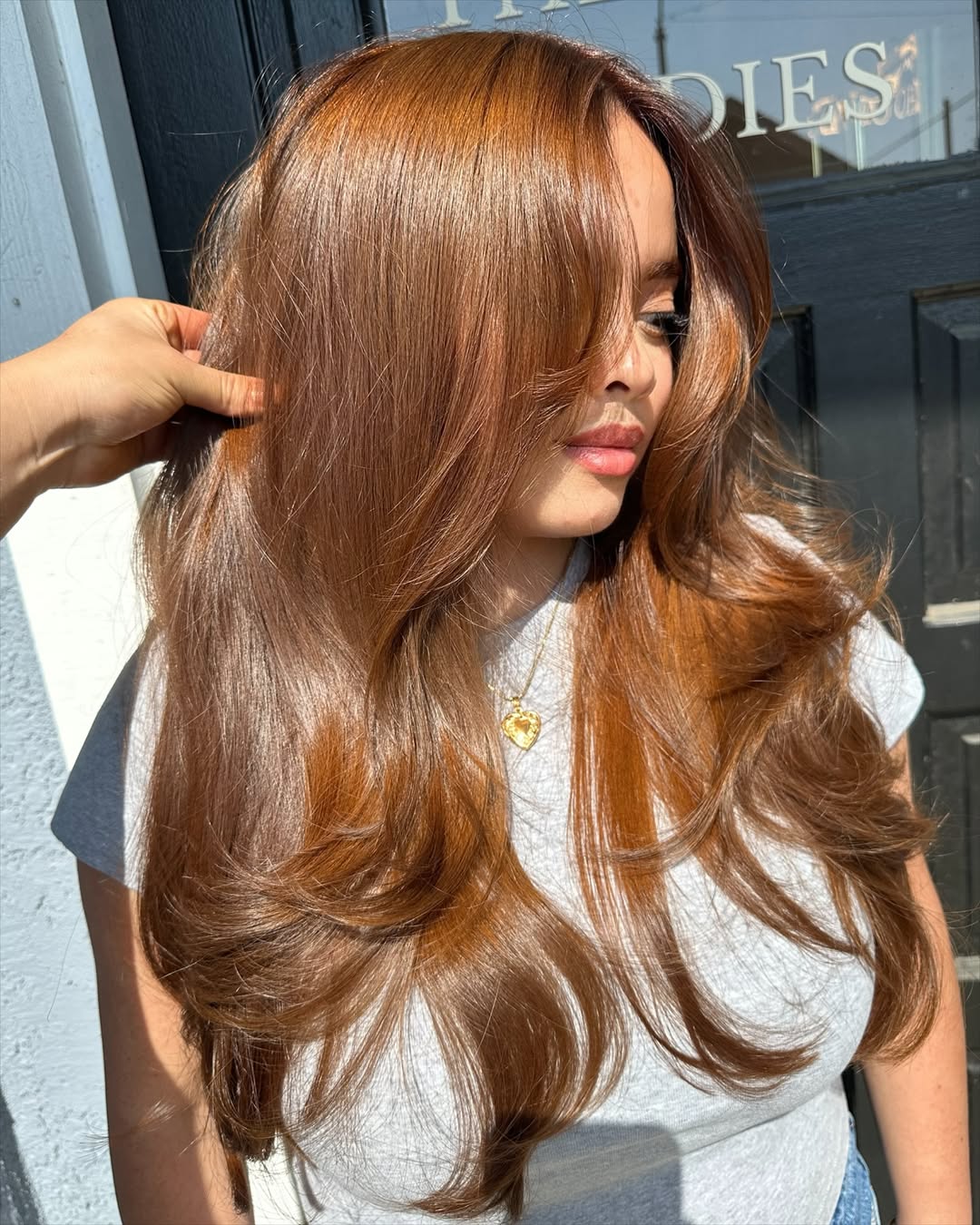 Warm Auburn Waves With Face-Framing Layers