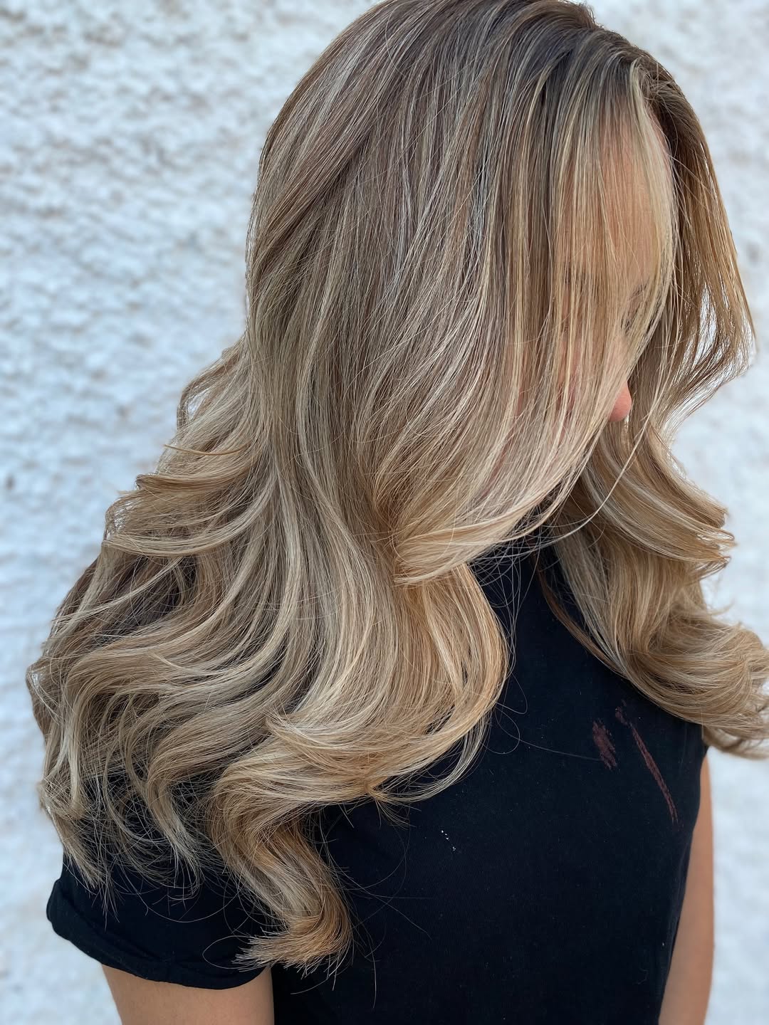 Warm Blonde Balayage Long Layers With Bouncy Curls