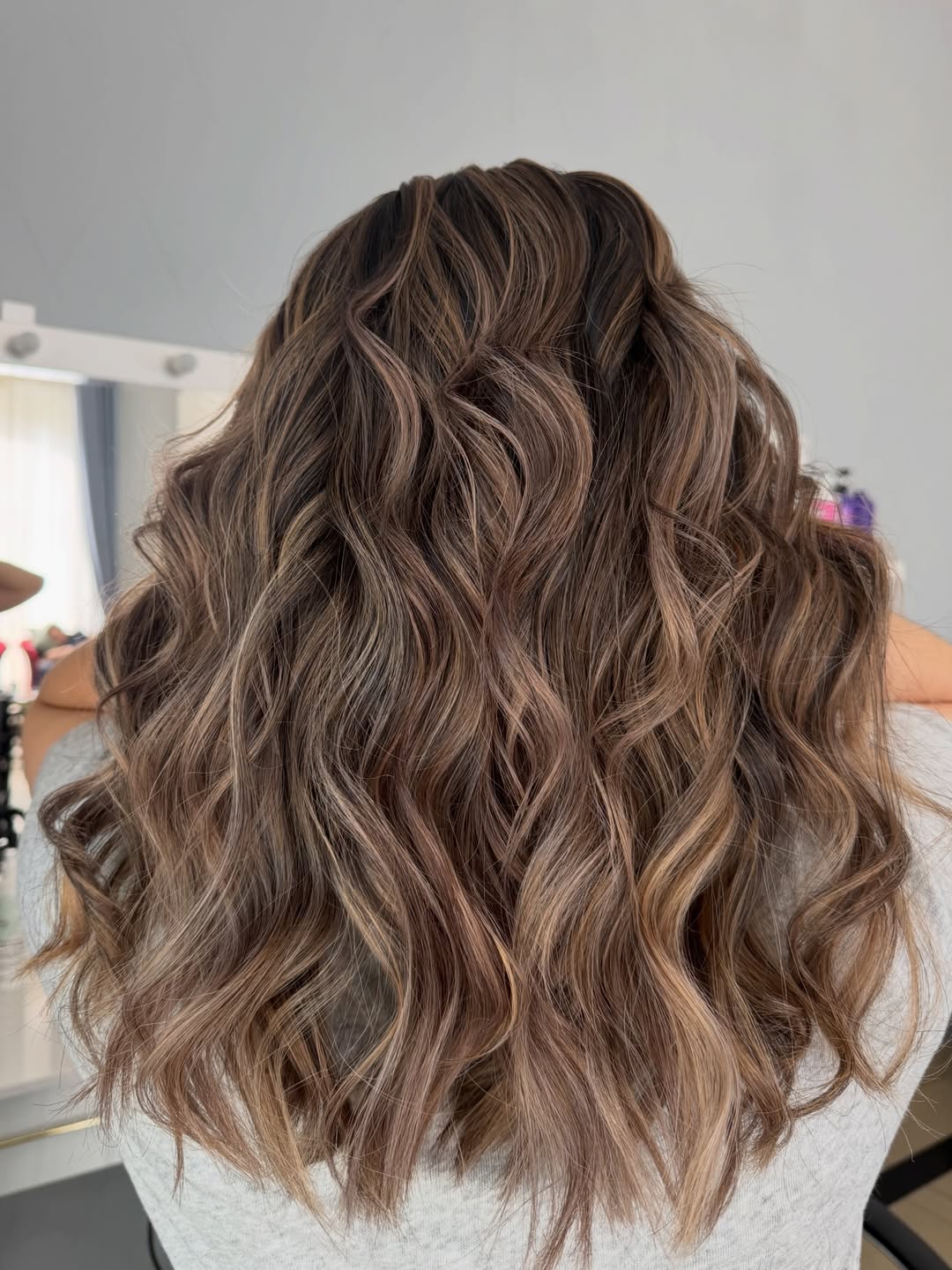 Warm Brunette Balayage With Loose Waves