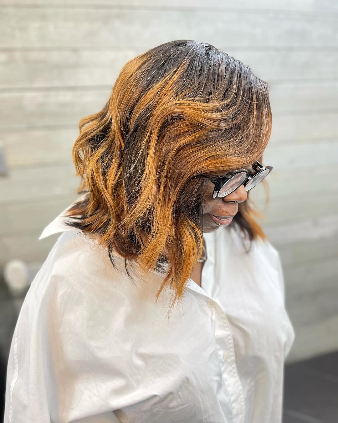 Warm Caramel Highlights On Dark Bob