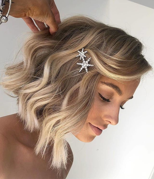 Wavy Blonde Bob With Star Hair Clips