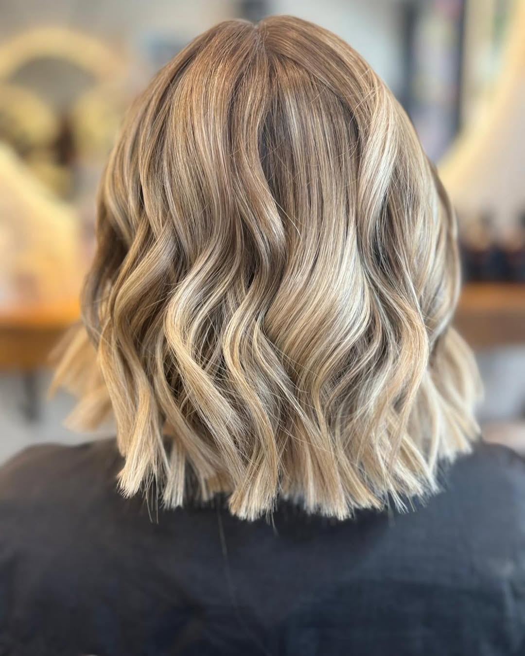 Wavy Dirty Blonde Bob With Natural Roots