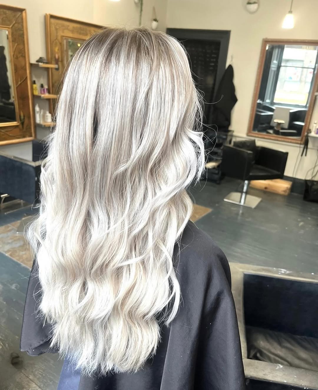 Wavy Platinum Blonde Balayage With Shadow Root