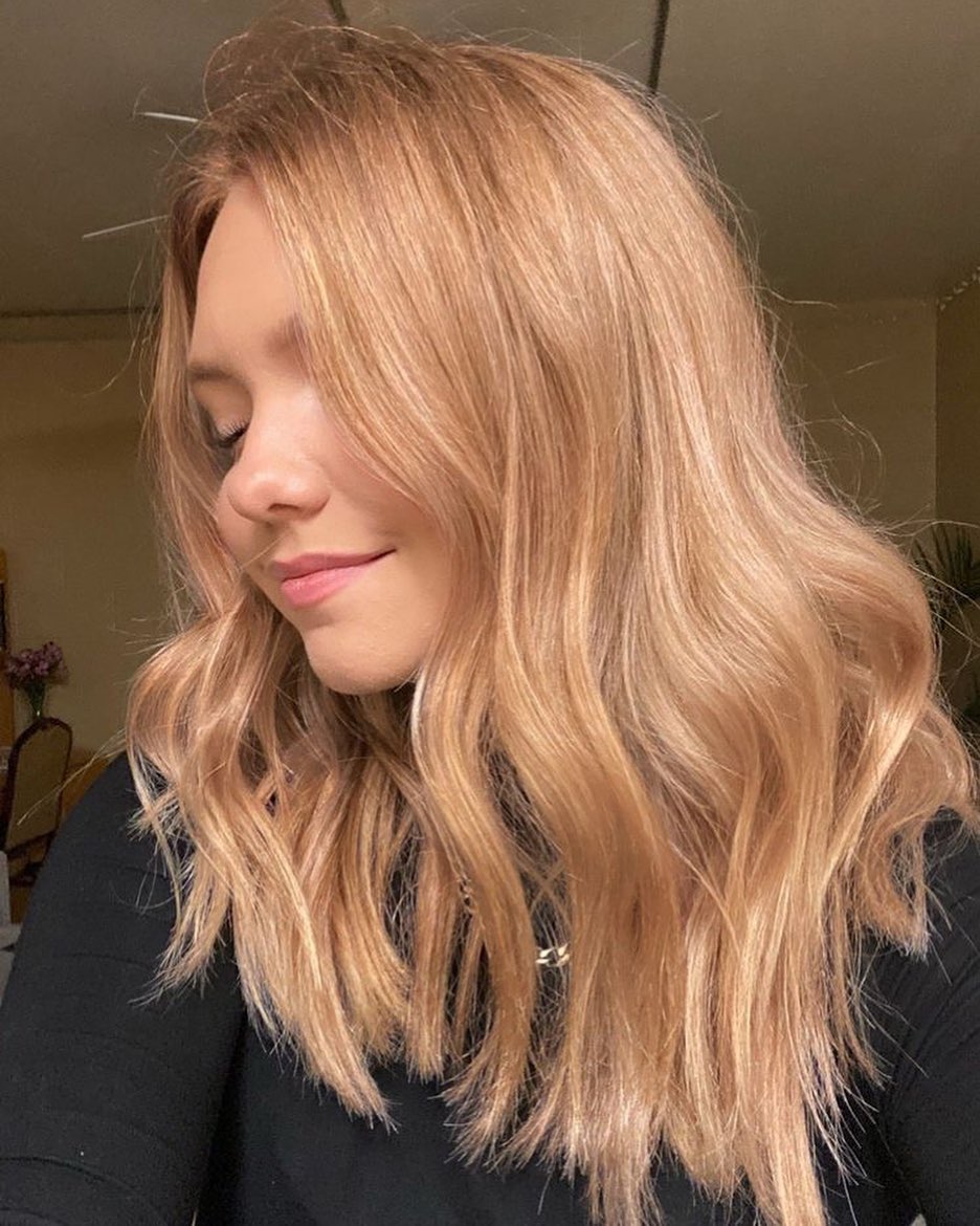 Wavy Strawberry Blonde Layers With Volume