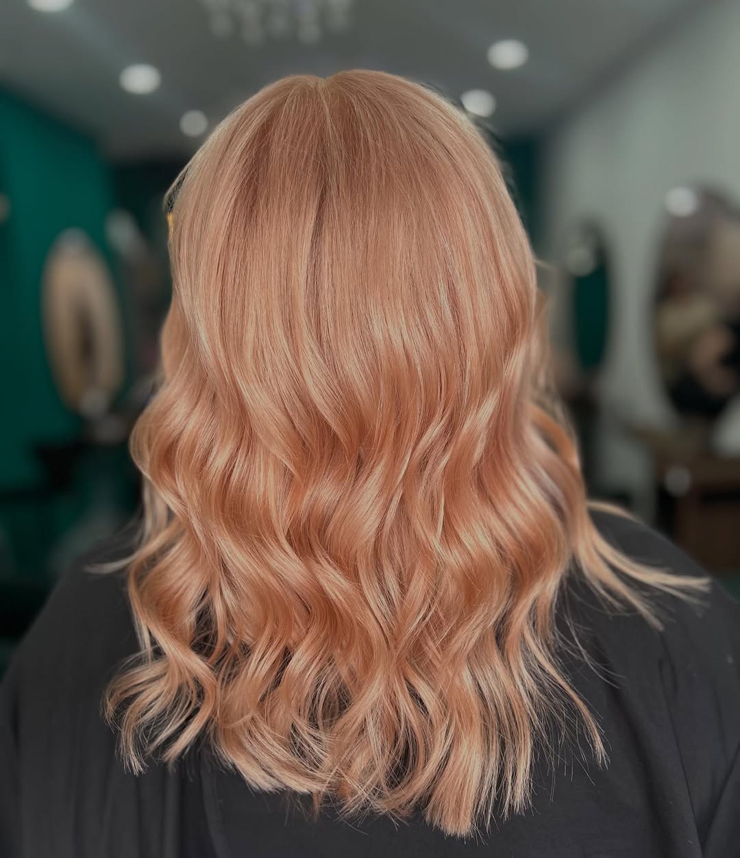 Wavy Strawberry Blonde Lob With Subtle Highlights