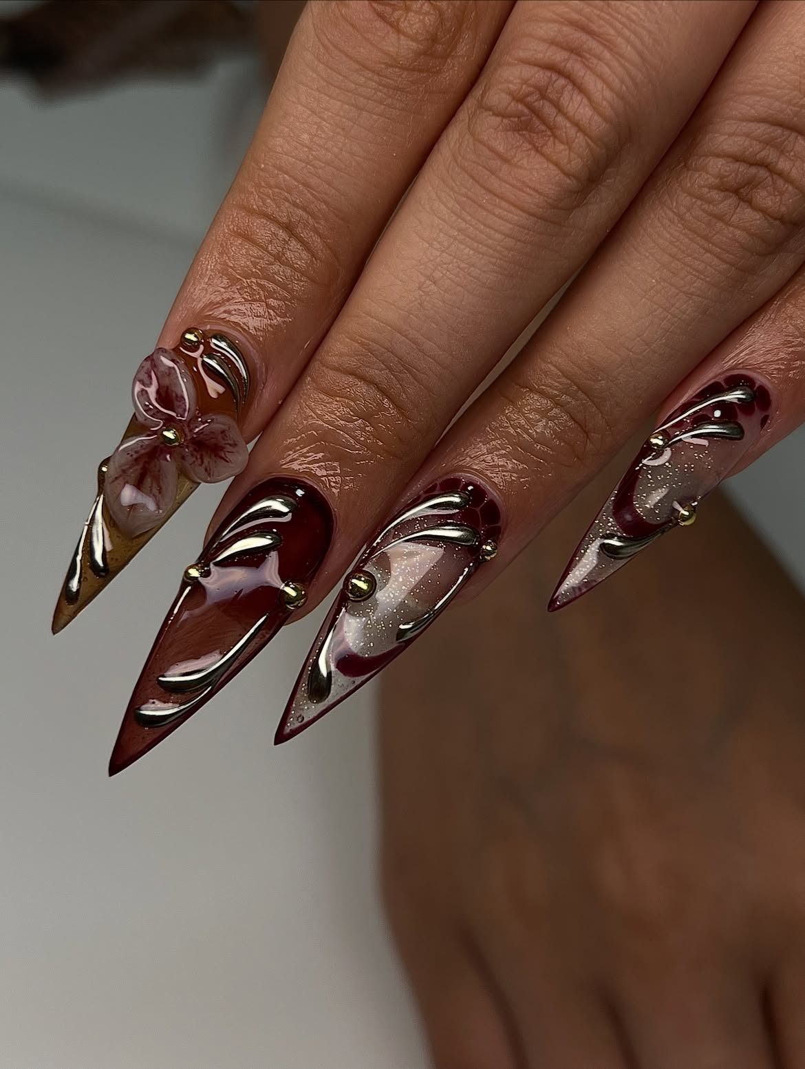 3D Floral Stiletto Nails With Burgundy Swirls
