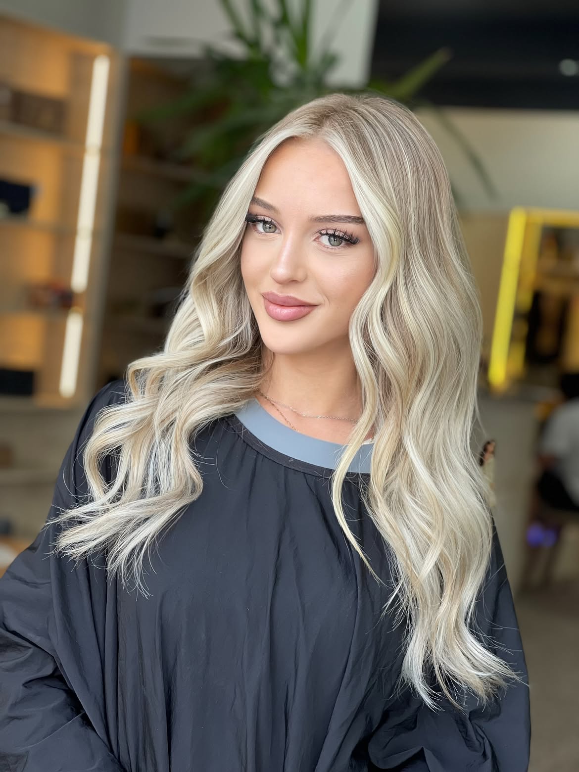 Beachy Ash Blonde Waves With Face-Framing Layers