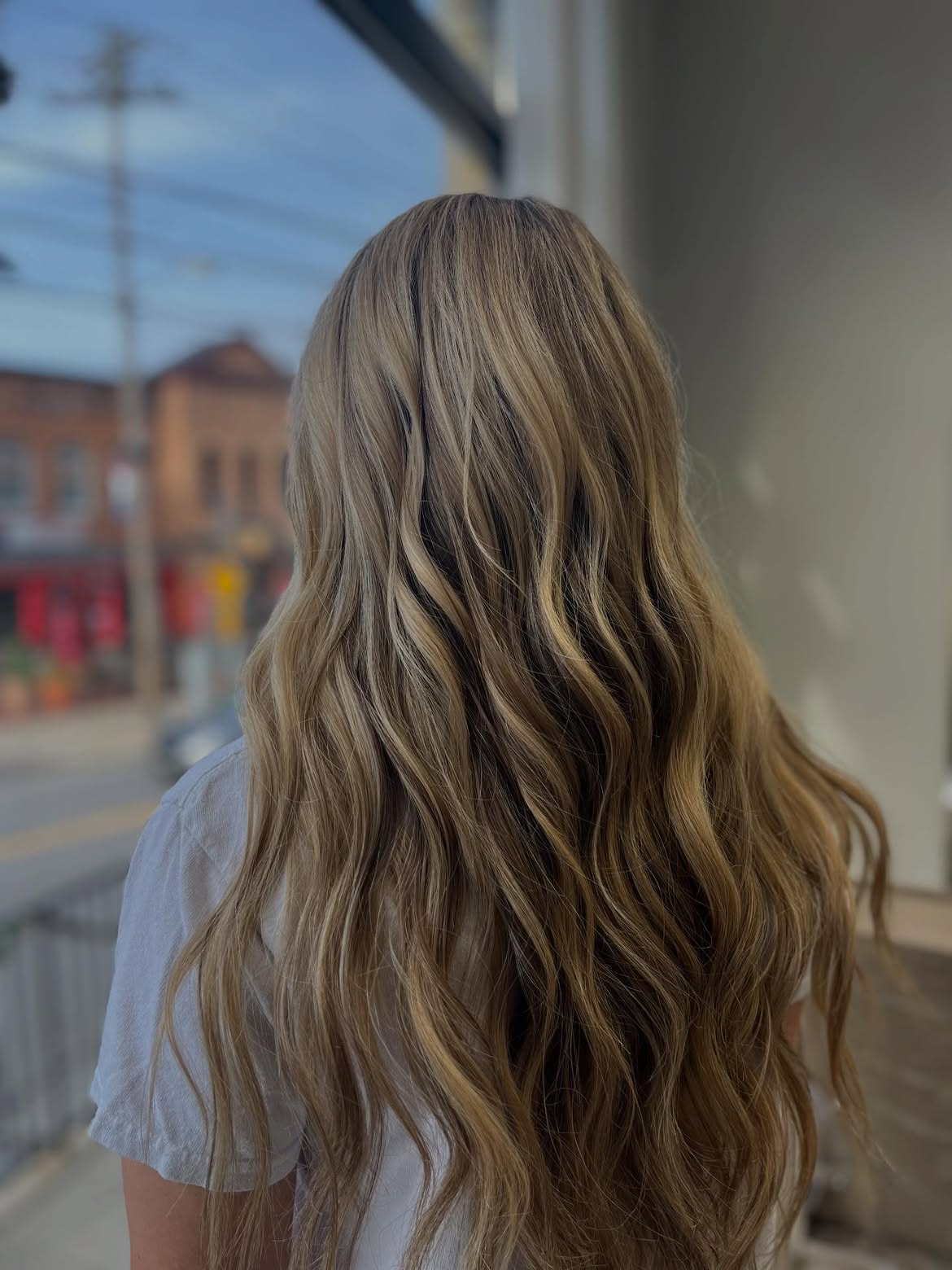 Beachy Bronde Waves With Face Framing Layers