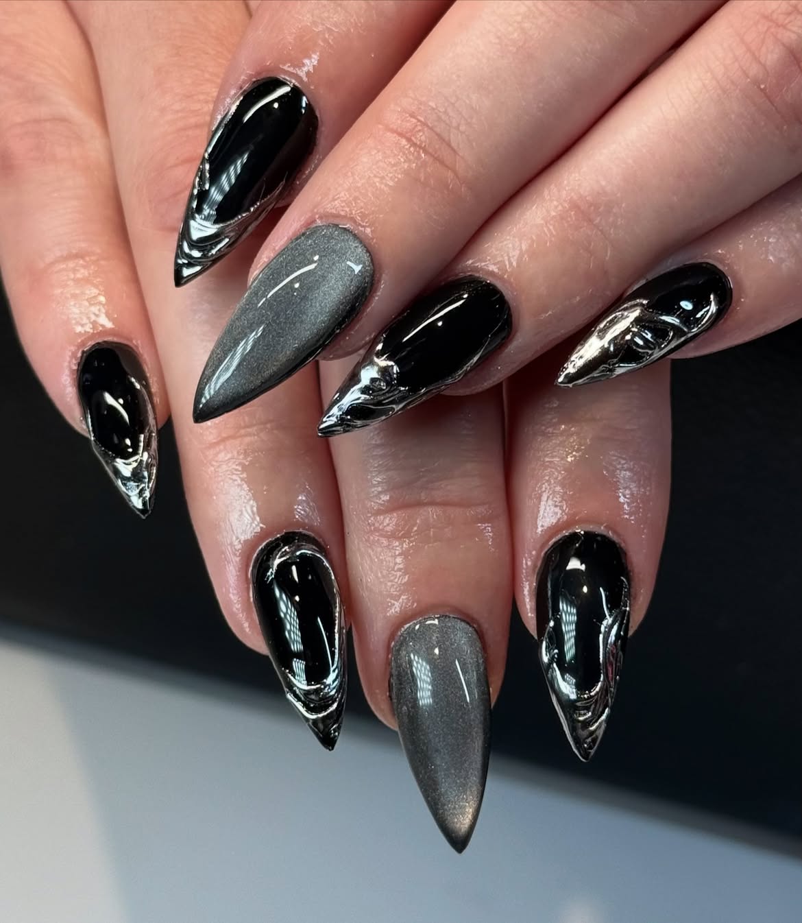 Black And Silver Chrome Cat Eye Stiletto Nails