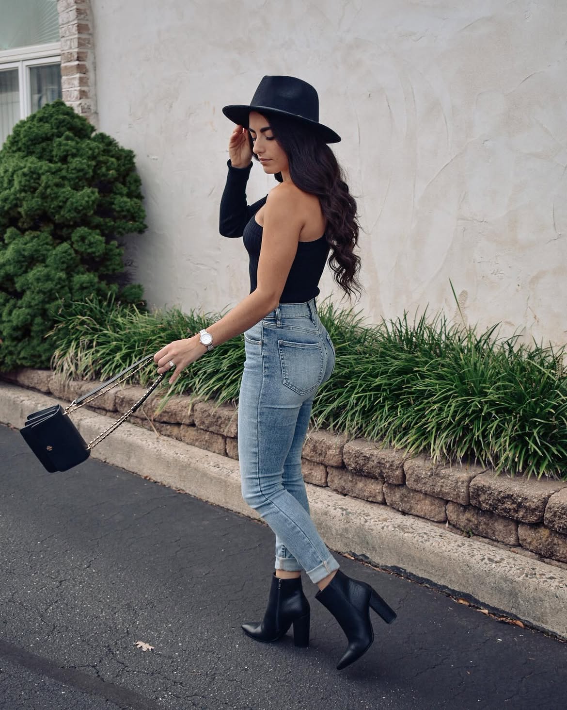 Black One-Shoulder Top With Light Wash Jeans