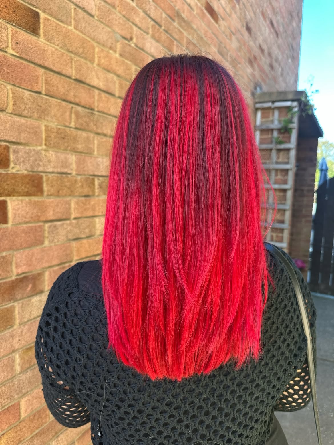 Bold Cherry Red Streaks With Dark Root