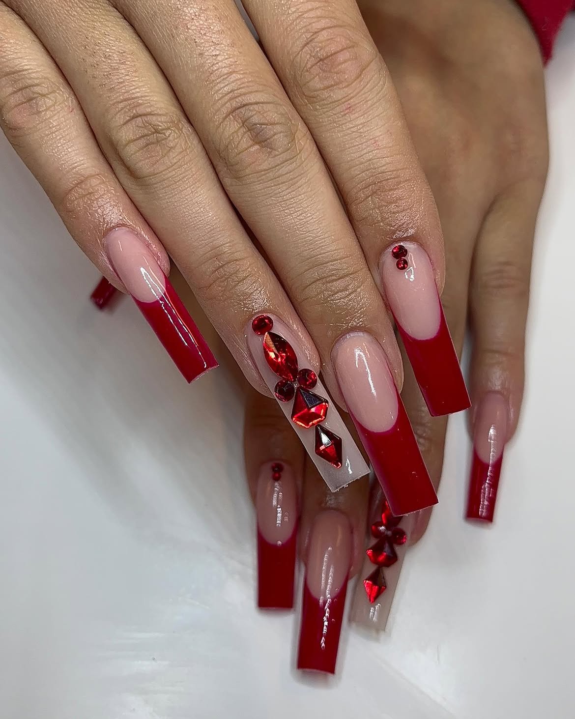 Bold Red French Tip Coffin Nails with Rhinestones