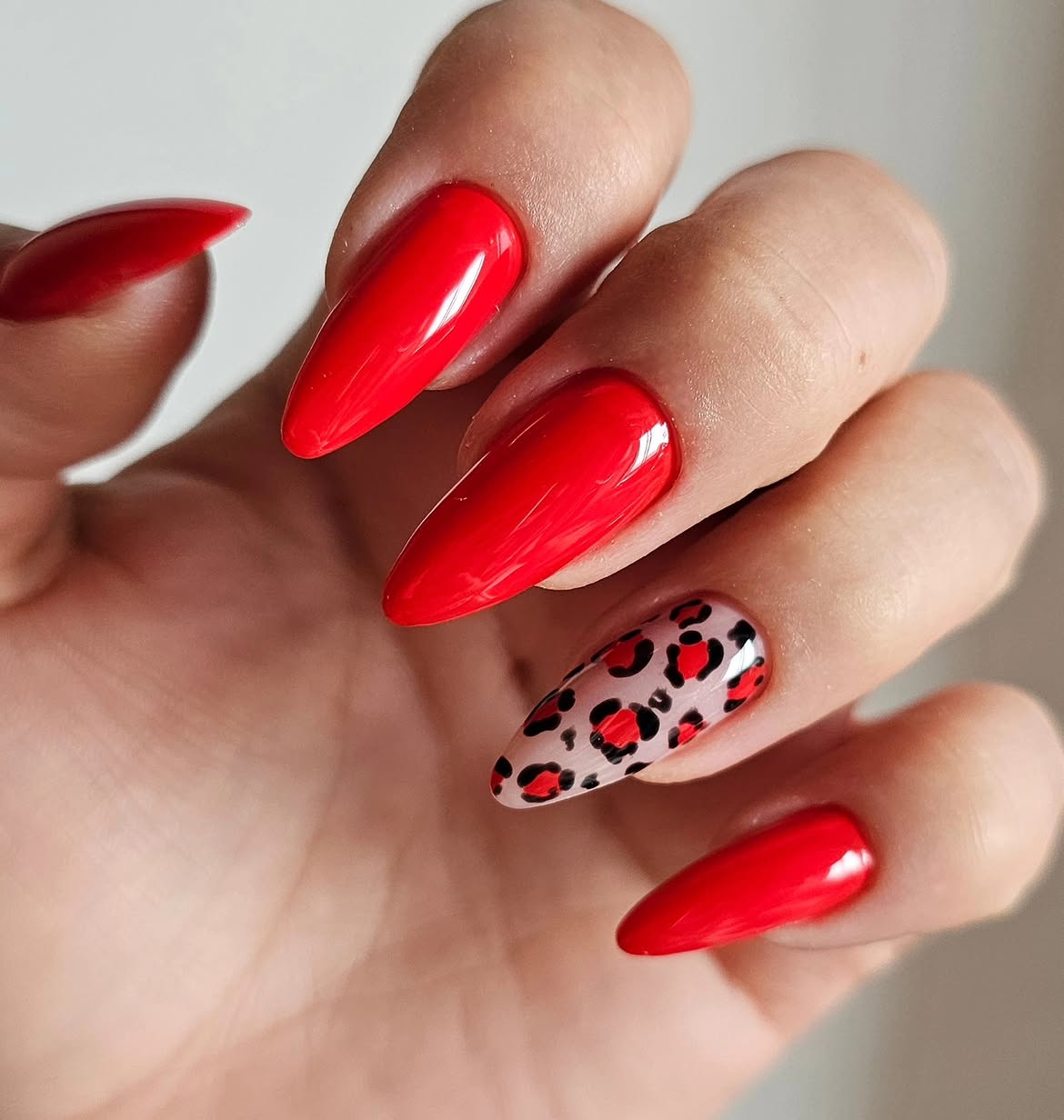 Bold Red Leopard Print Stiletto Nails