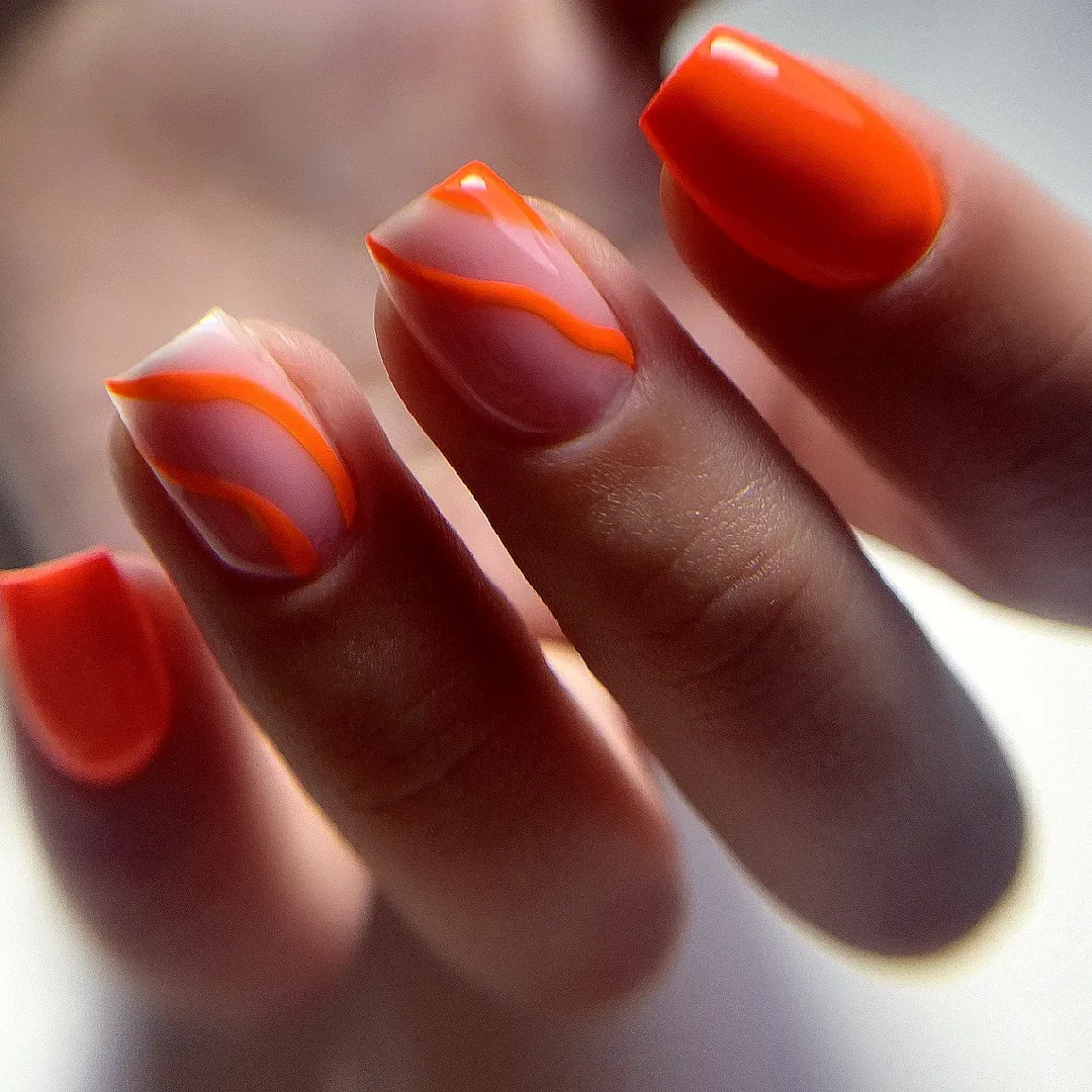 Bright Orange Swirl French Tip Nails