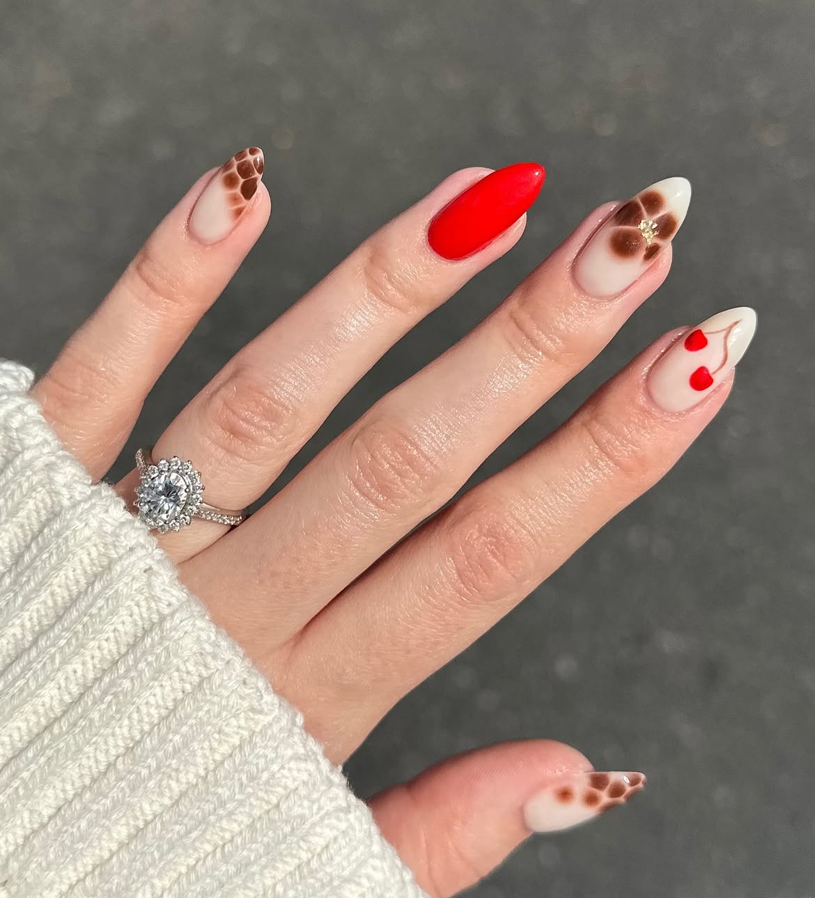 Bright Red Glossy Almond Nails With Fall Accents