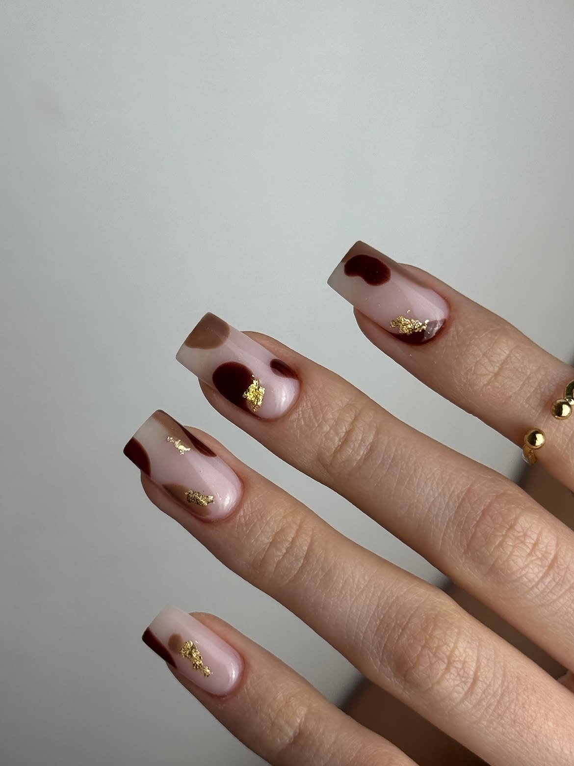 Brown and Burgundy Cow Print French Tips