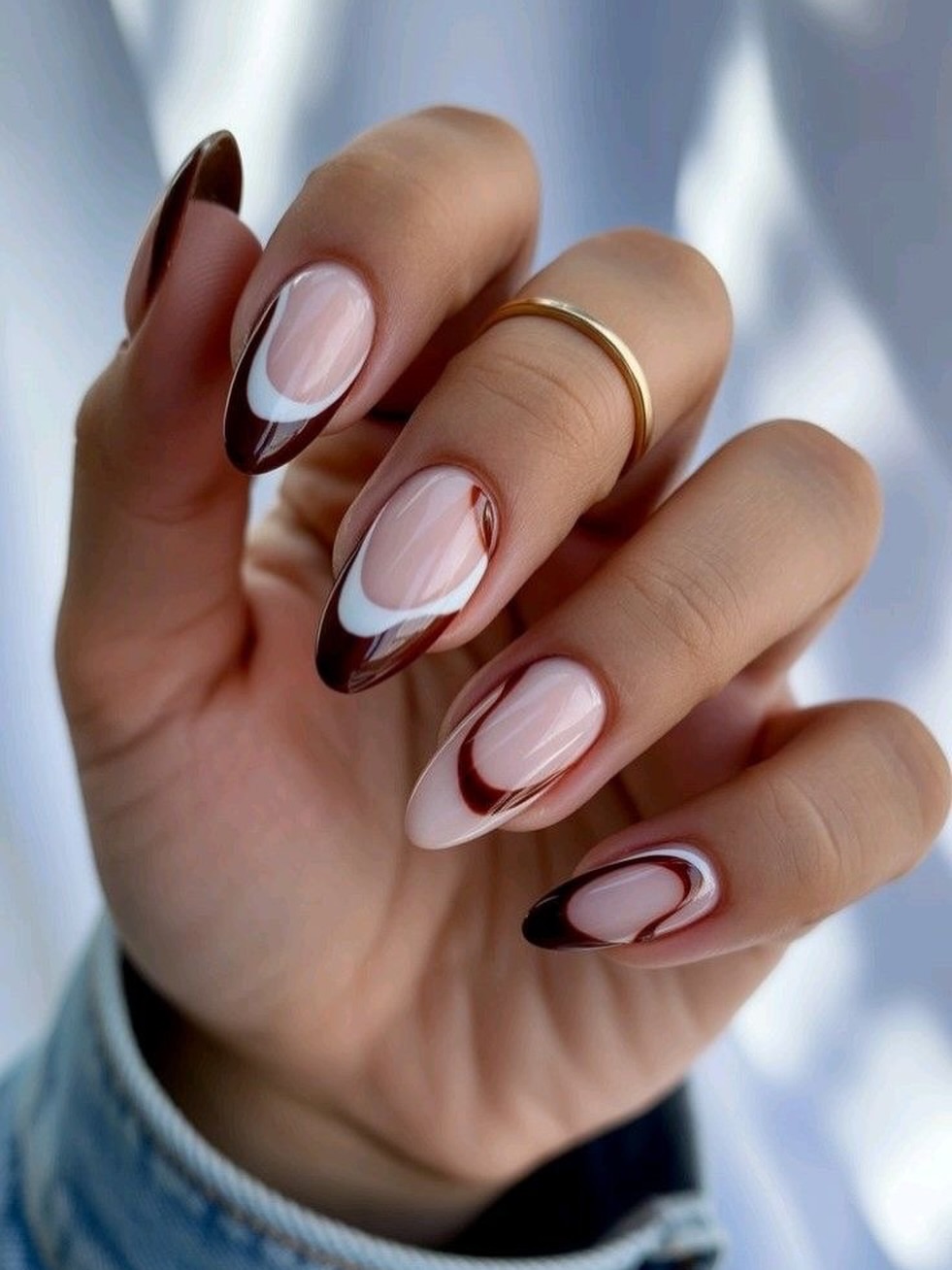 Brown French Aura Almond Nails