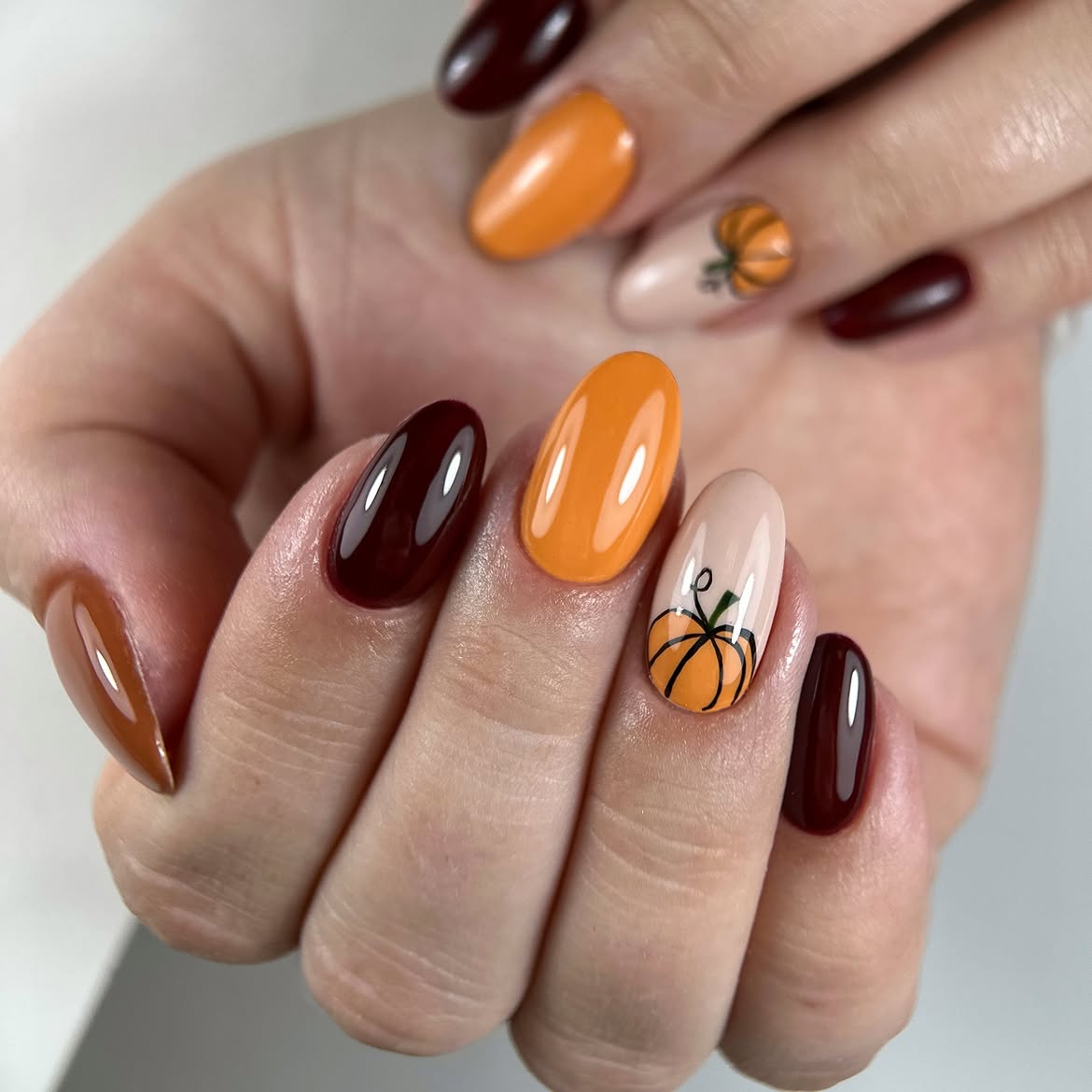 28 Stunning Pumpkin Nail Ideas for a Chic Fall Look 21 Charming Pumpkin Patch Oval Nails