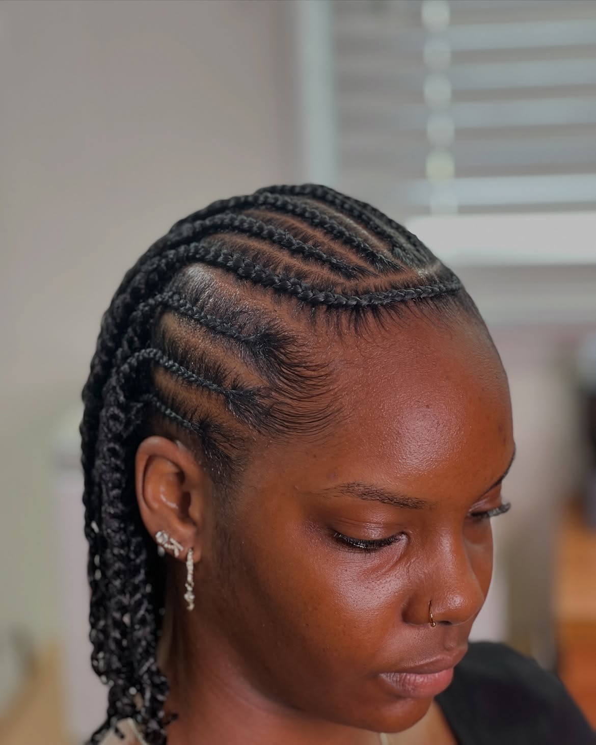 Chic Braided Crown With Wispy Edges