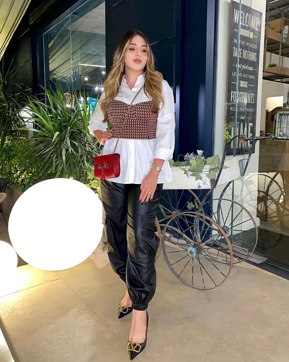 Chic Corset Top Over Button-Down And Leather Pants