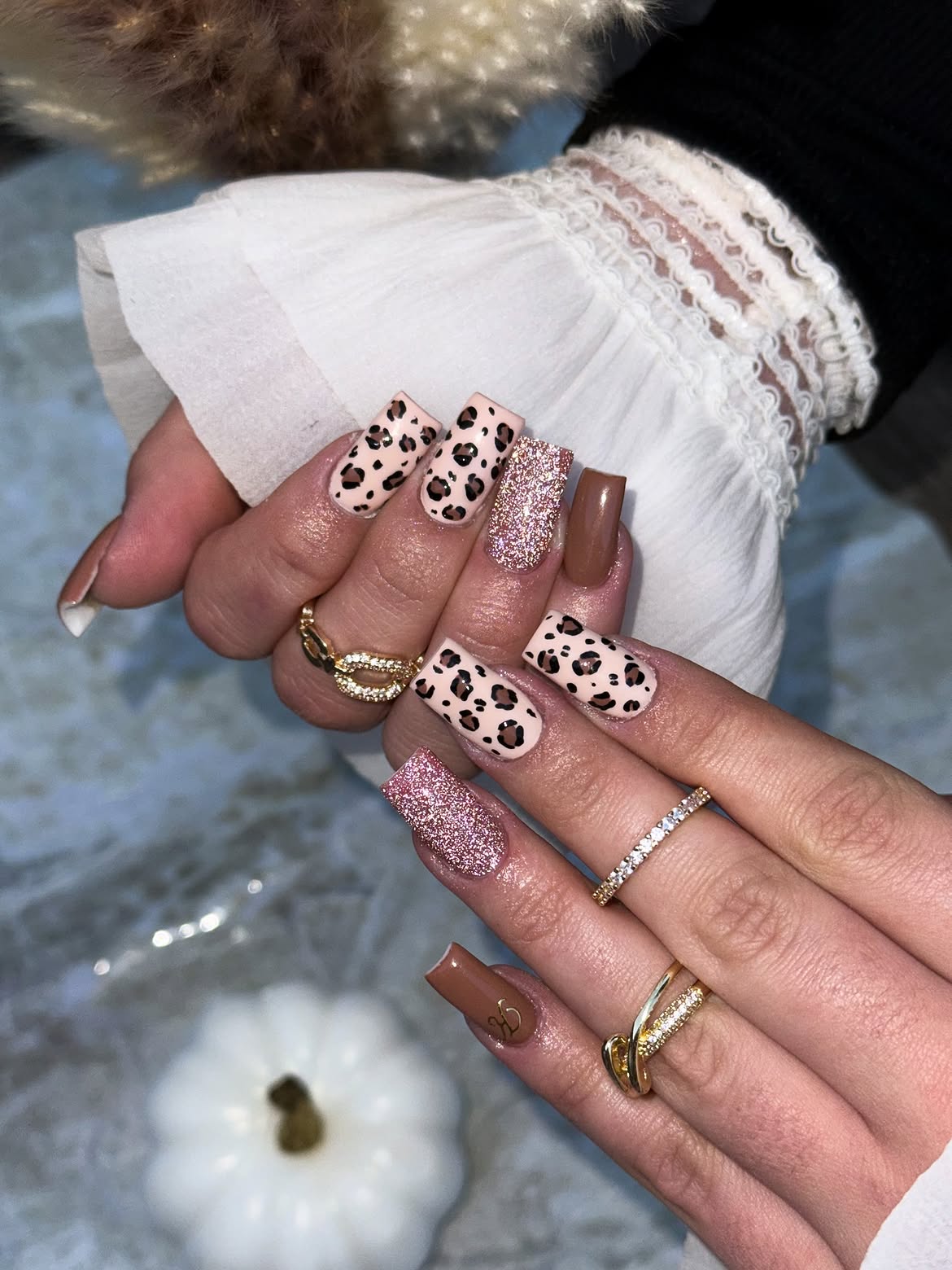 Chic Leopard Print and Rose Gold Glitter Nails