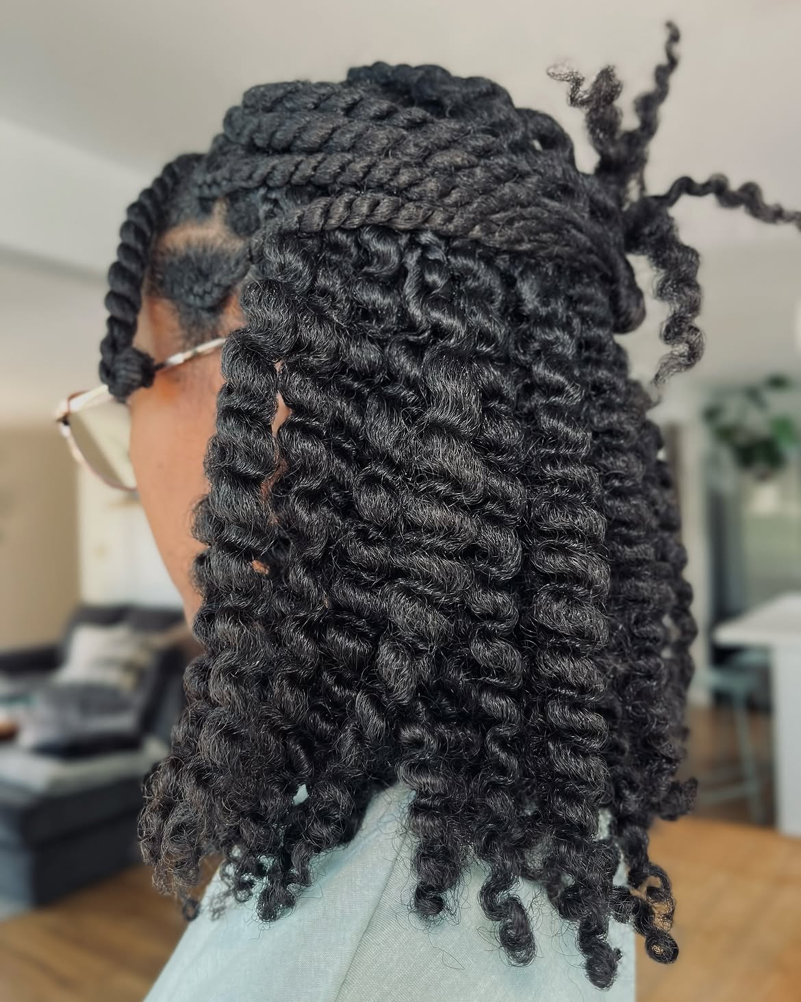 Chic Twisted Updo With Defined Coils