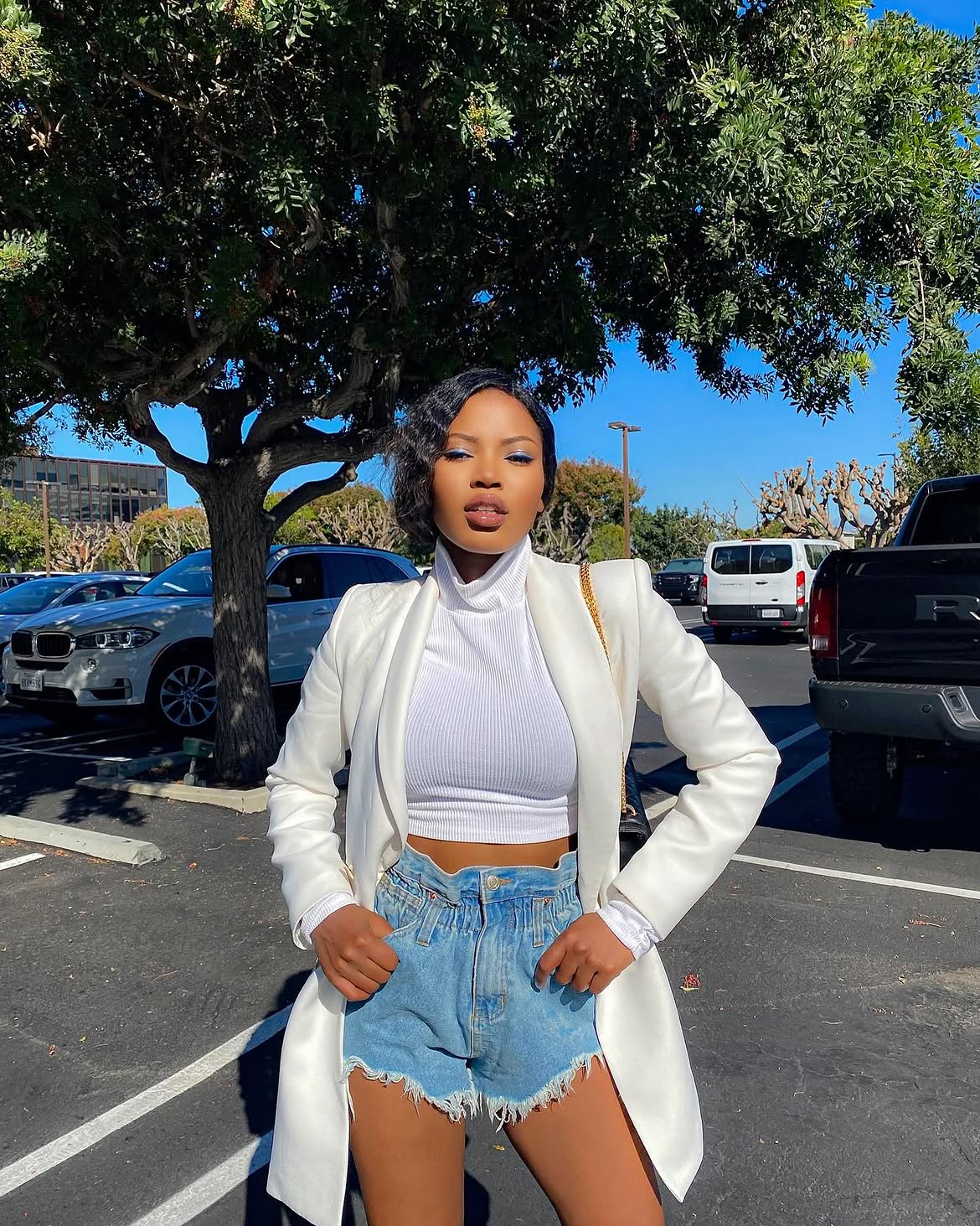 Chic White Blazer And Denim Shorts Combo