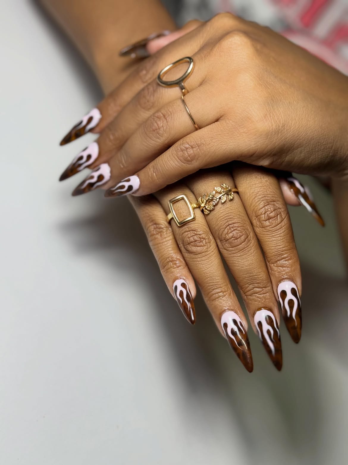 Chocolate Flame Stiletto Nails with Pink Accents