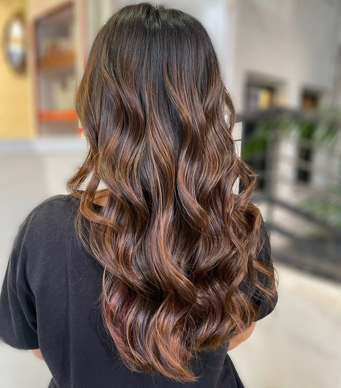 Cinnamon Swirl Balayage On Long Wavy Brunette