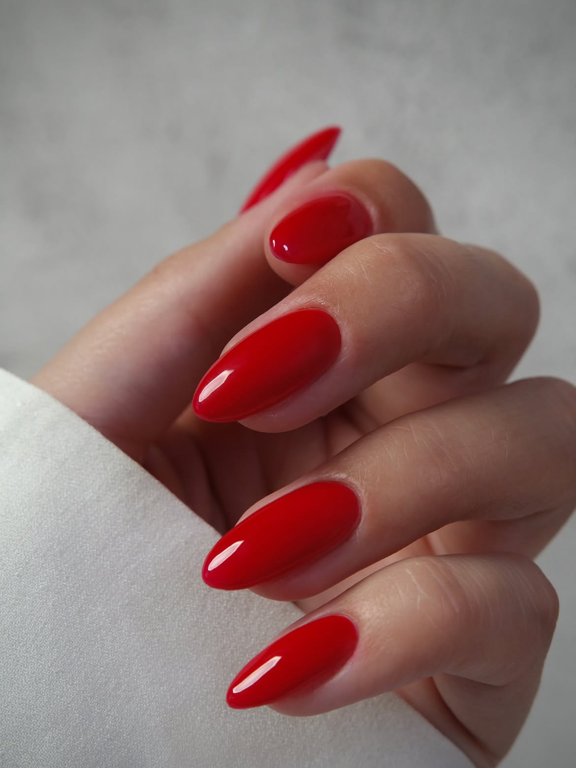 Classic Bright Red Glossy Almond Nails