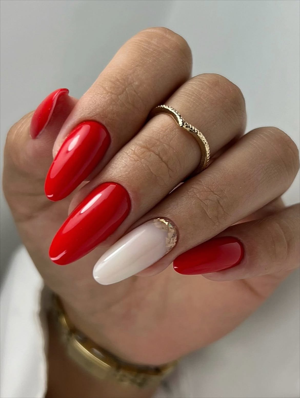 Classic Red and Gold Accent Almond Nails