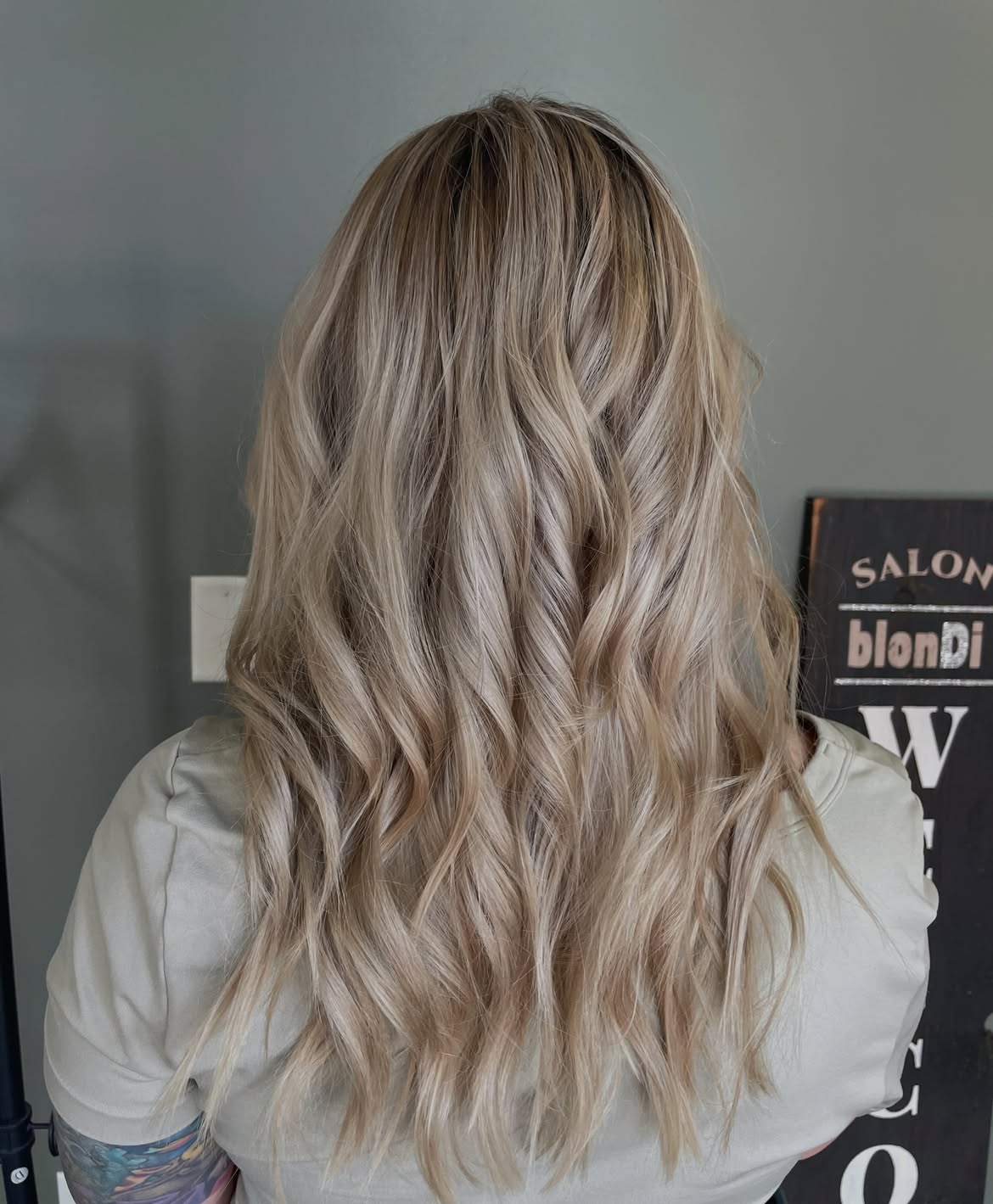 Cool Toned Blonde Waves With Subtle Face Framing