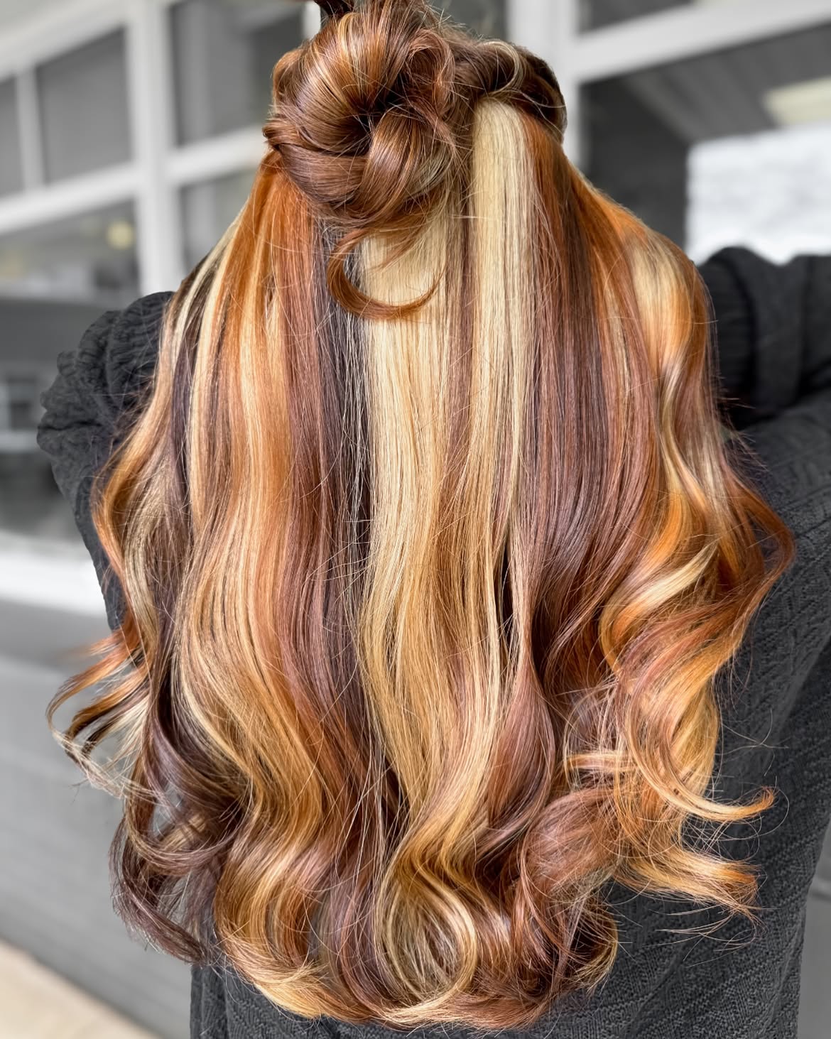 Copper and Blonde Chunky Highlights Half-Up Bun