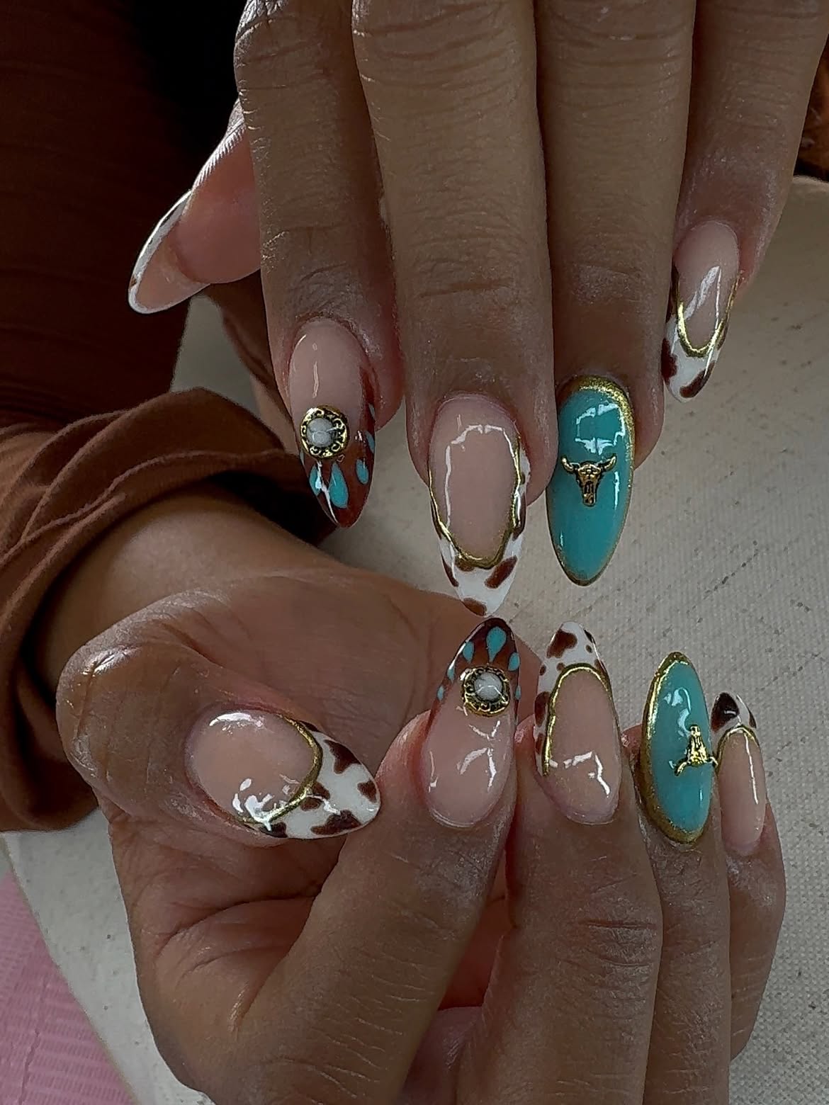 Cow Print and Turquoise Western Nail Art
