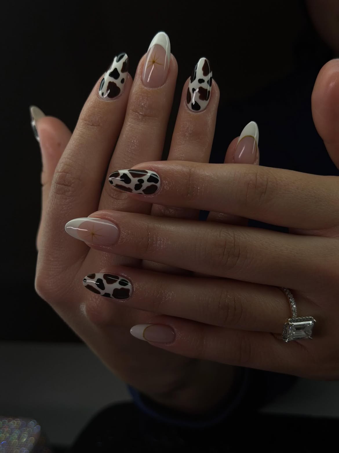 Cow Print French Tip Almond Nails with Gold Accents
