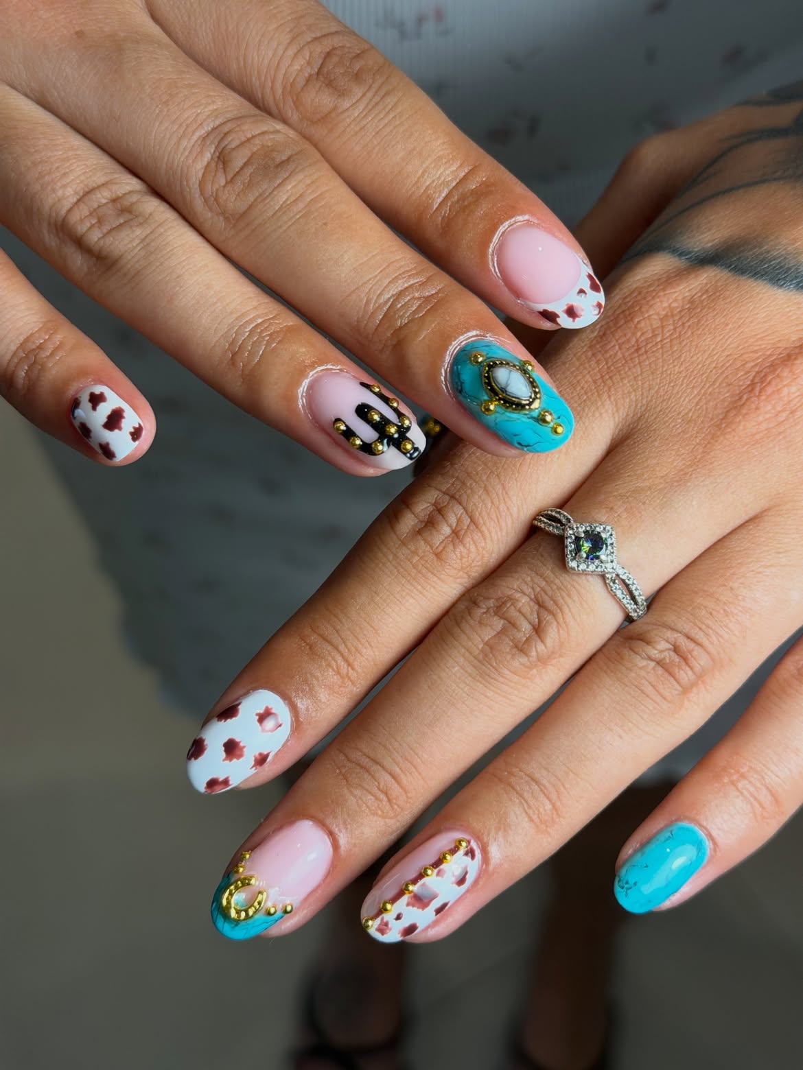 Cow Print & Turquoise Western Oval Nails